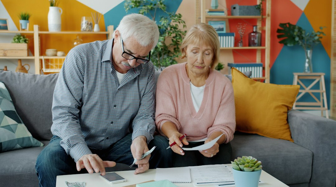 couple reviewing financial documents