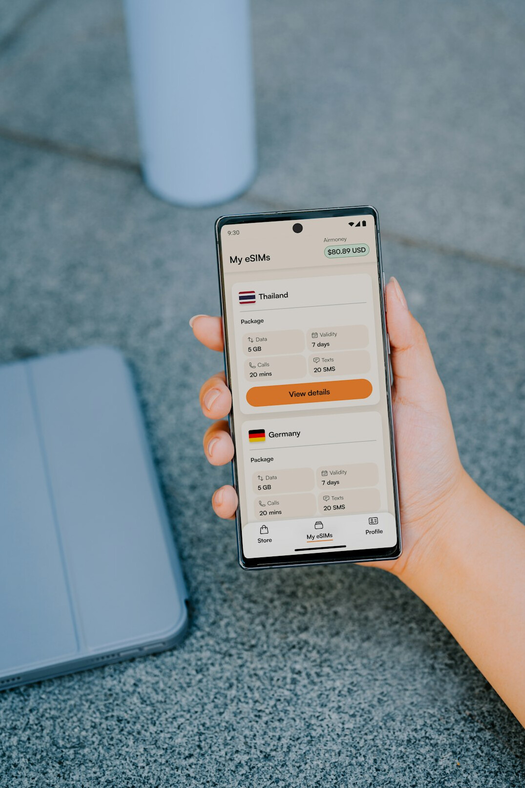 person tracking expenses on phone