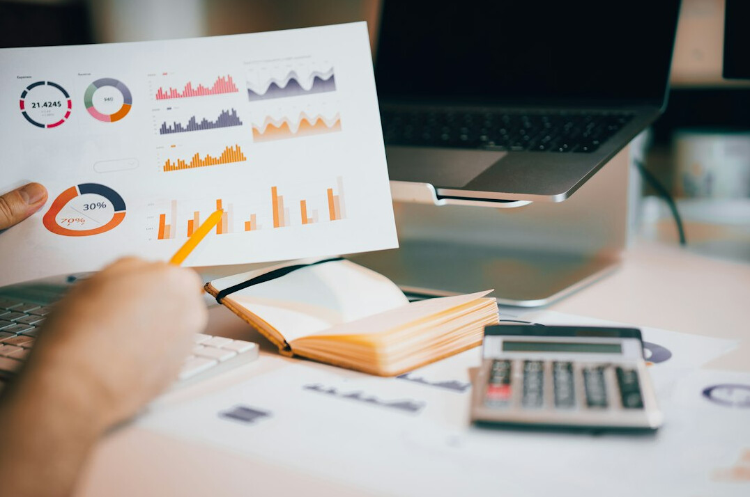 person reviewing budget spreadsheet
