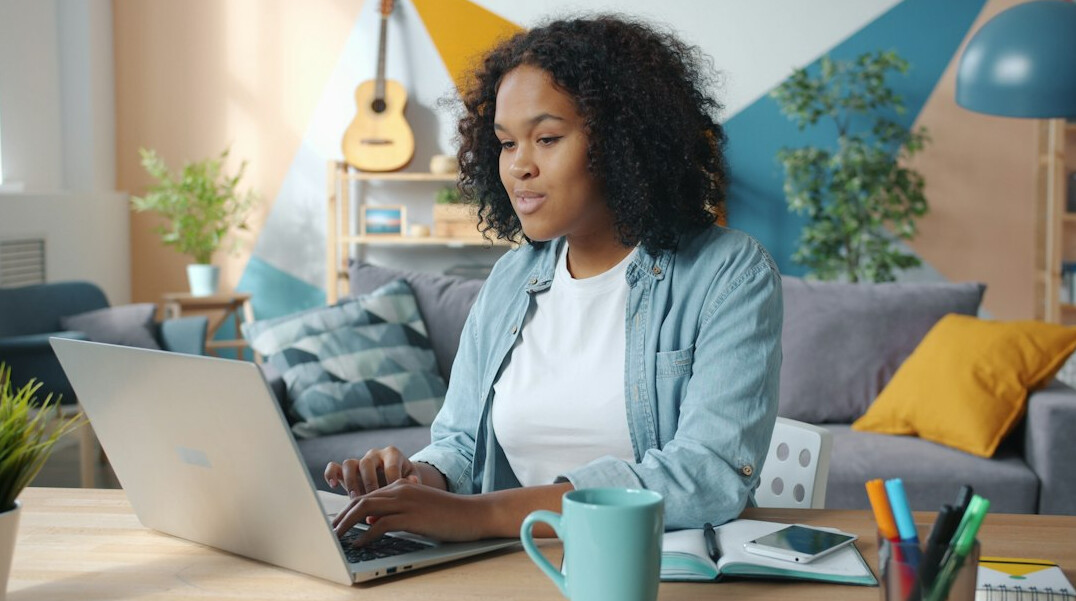 woman calculating budget at home